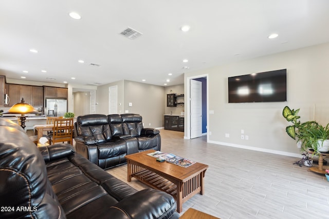 living room featuring light wood-type flooring