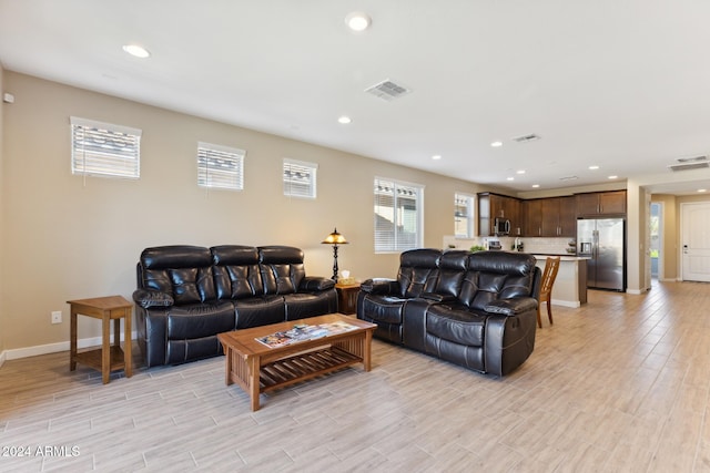 living room featuring light wood-type flooring