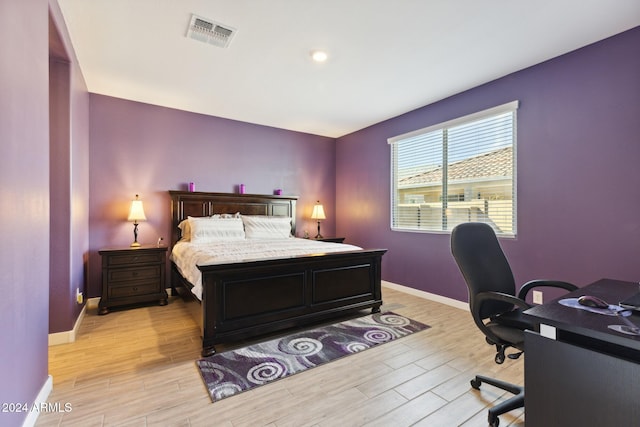 bedroom featuring light hardwood / wood-style flooring