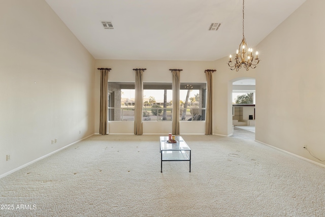 unfurnished living room with light carpet, vaulted ceiling, and a notable chandelier