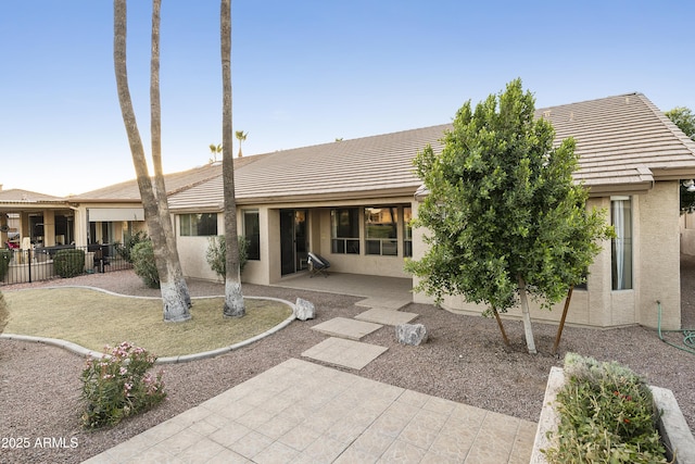 view of front of property with a patio