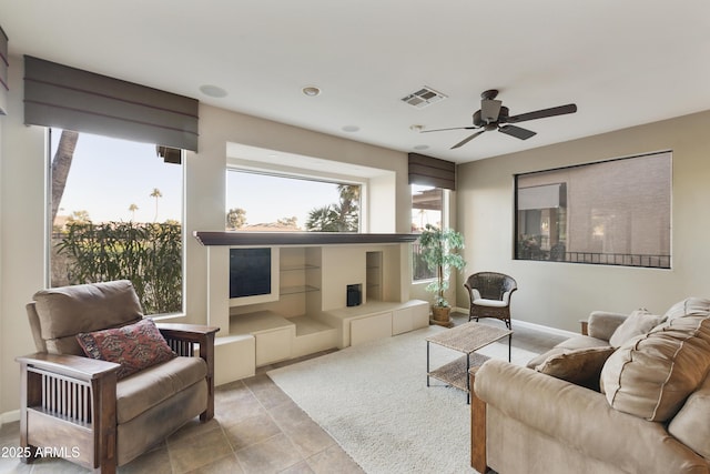 living room featuring ceiling fan