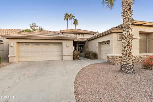 view of front of home with a garage