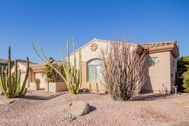 view of front of property featuring a garage