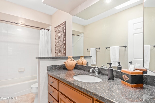 full bathroom with vanity, toilet, tile patterned flooring, and shower / bath combo with shower curtain