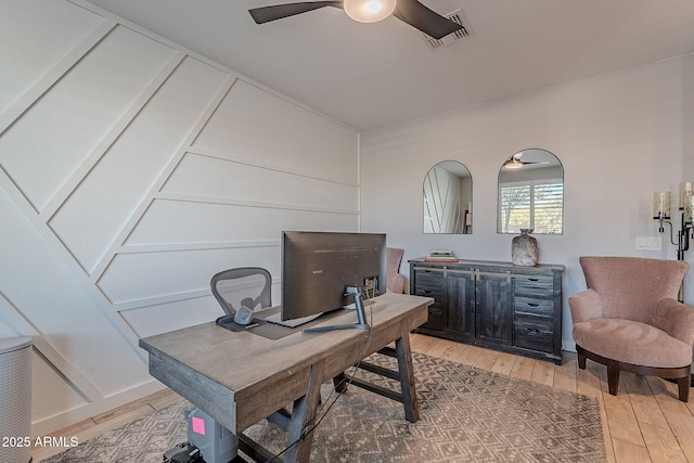 office area featuring hardwood / wood-style flooring and ceiling fan