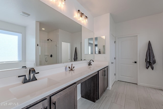 bathroom featuring walk in shower and vanity