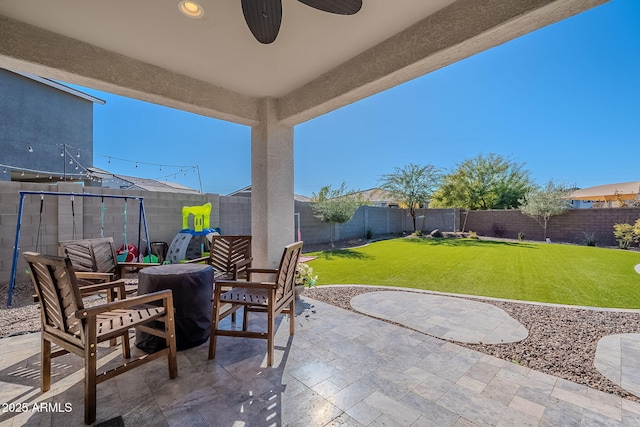 view of patio / terrace featuring ceiling fan