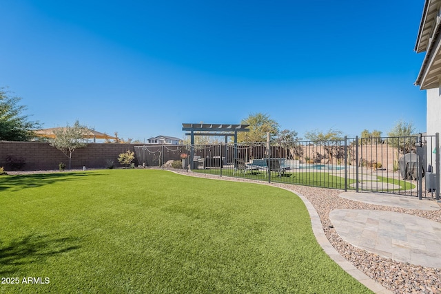 view of yard featuring a fenced in pool and a pergola