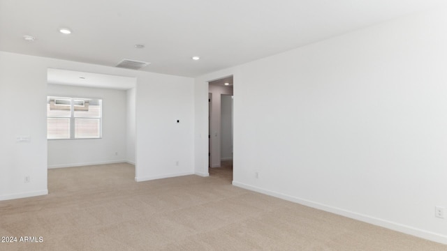 7327 W Buckhorn Trl, Peoria, AZ 85383 - spare room featuring recessed lighting, light colored carpet, and baseboards