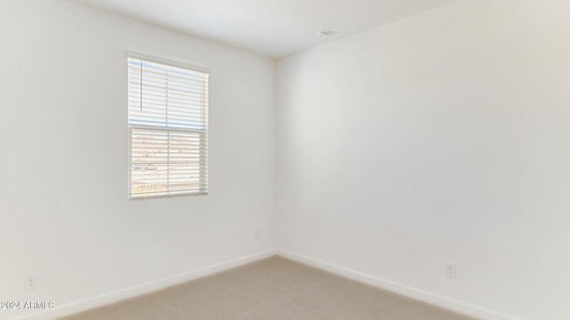 7327 W Buckhorn Trl, Peoria, AZ 85383 - empty room featuring light colored carpet and baseboards
