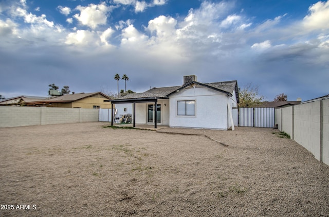 back of property featuring a patio area