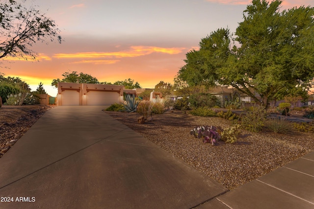 view of front of property featuring a garage