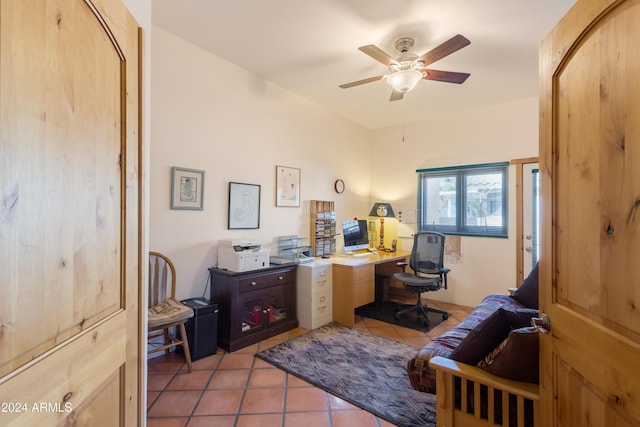 home office featuring ceiling fan and light tile patterned floors