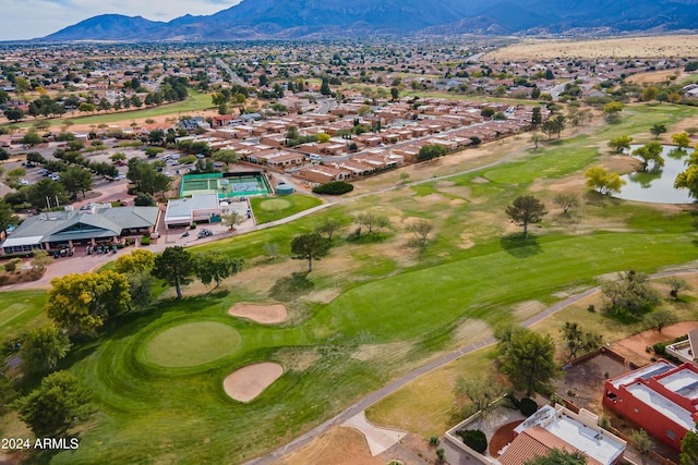 bird's eye view with a water and mountain view