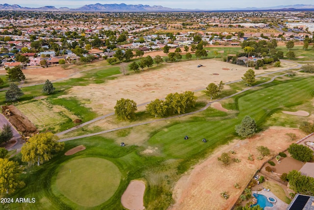 birds eye view of property with a mountain view