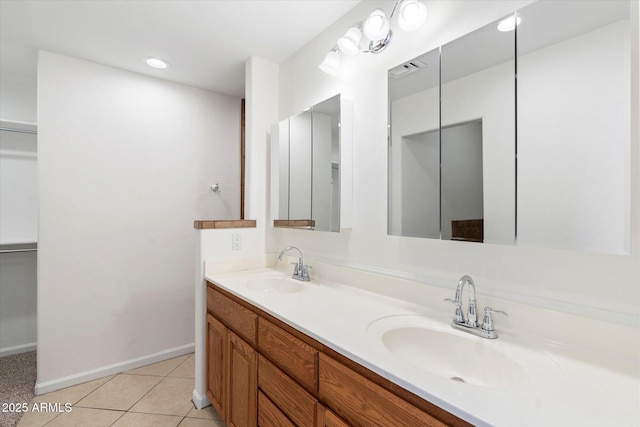 bathroom featuring tile patterned floors and vanity