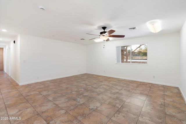 spare room featuring ceiling fan