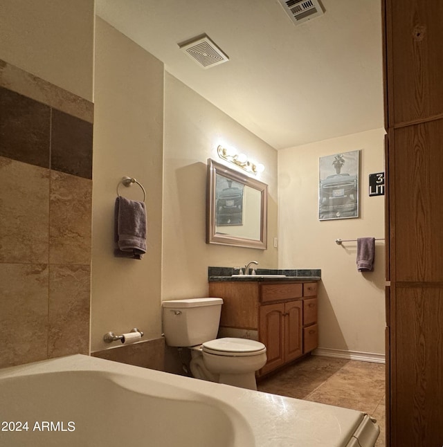 bathroom featuring tile patterned floors, visible vents, toilet, and vanity