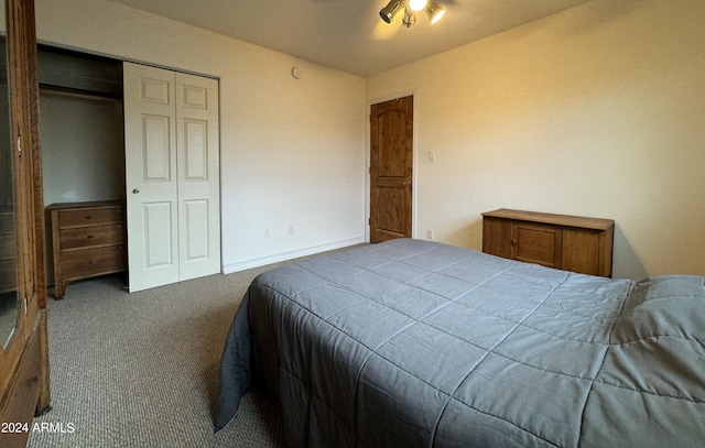 bedroom featuring carpet flooring, a closet, and ceiling fan