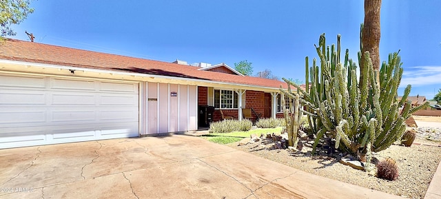 ranch-style home with a garage