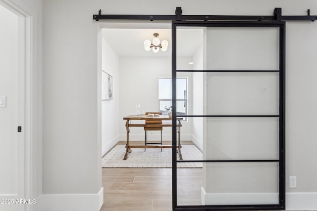 unfurnished office with a barn door