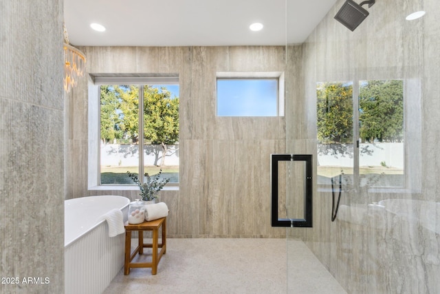 bathroom featuring plus walk in shower