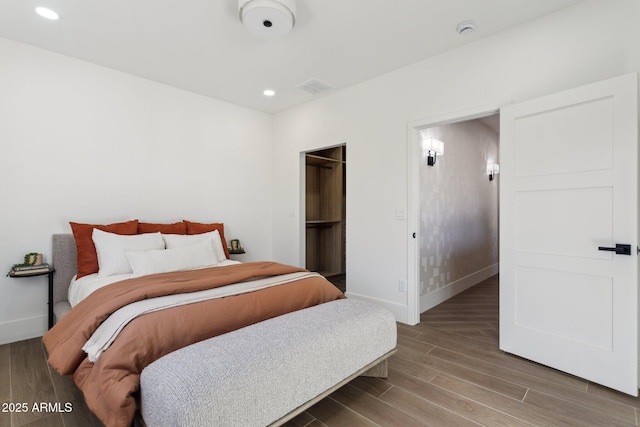 bedroom featuring hardwood / wood-style floors