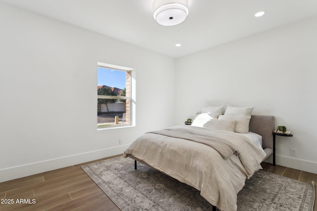 bedroom featuring hardwood / wood-style flooring