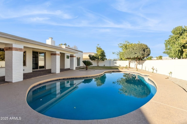 view of swimming pool featuring a patio