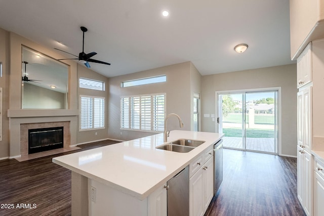 1227 E Sheena Dr, Phoenix, AZ 85022 - kitchen with a sink, dark wood-style floors, dishwasher, light countertops, and ceiling fan