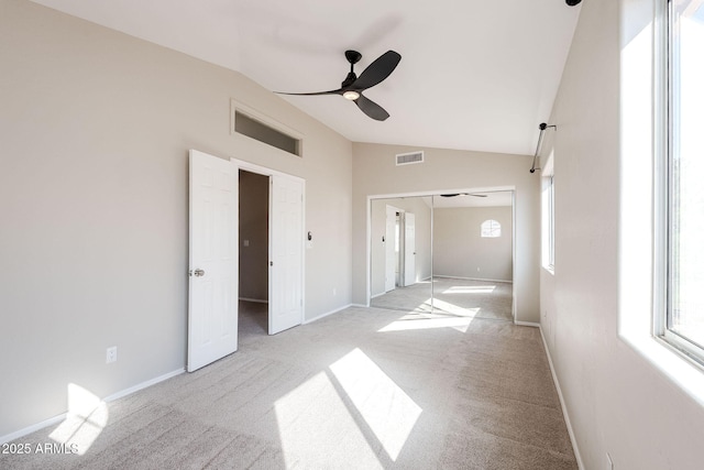 1227 E Sheena Dr, Phoenix, AZ 85022 - unfurnished bedroom featuring lofted ceiling, light carpet, baseboards, a ceiling fan, and a closet