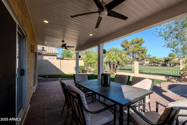 1227 E Sheena Dr, Phoenix, AZ 85022 - view of patio featuring a ceiling fan, outdoor dining space, and a fenced backyard