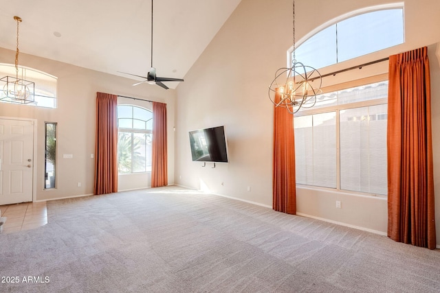 1227 E Sheena Dr, Phoenix, AZ 85022 - unfurnished living room featuring a chandelier, high vaulted ceiling, carpet floors, baseboards, and ceiling fan