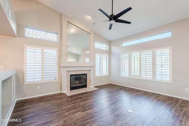 1227 E Sheena Dr, Phoenix, AZ 85022 - unfurnished living room with ceiling fan, high vaulted ceiling, wood finished floors, a fireplace, and baseboards
