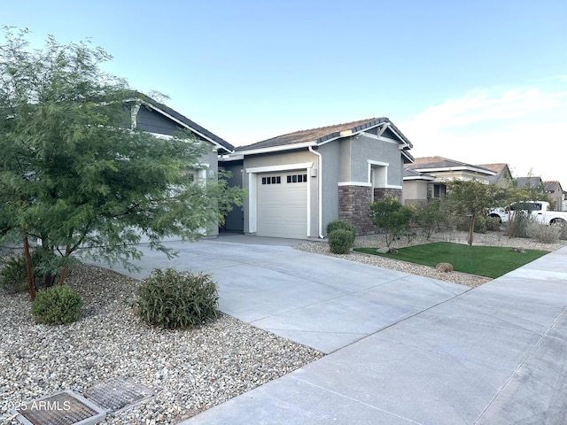 view of side of home featuring a garage