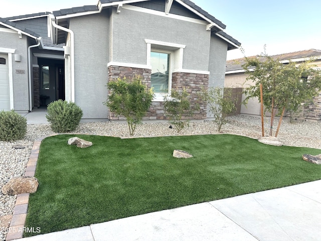 view of property exterior featuring a lawn