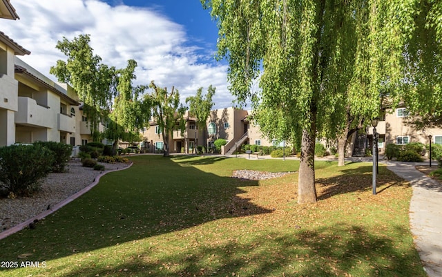 9450 E Becker Ln Unit 1102, Scottsdale, AZ 85260 - view of property's community with a residential view and a lawn