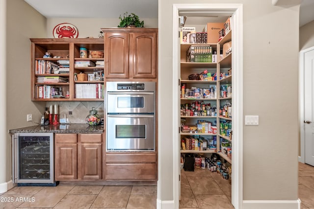 2565 N 141st Ln, Goodyear, AZ 85395 - pantry with wine cooler