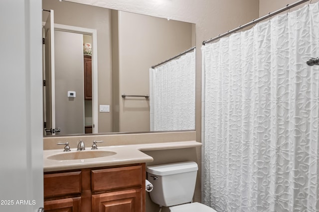 2565 N 141st Ln, Goodyear, AZ 85395 - bathroom with vanity, toilet, and a shower with shower curtain