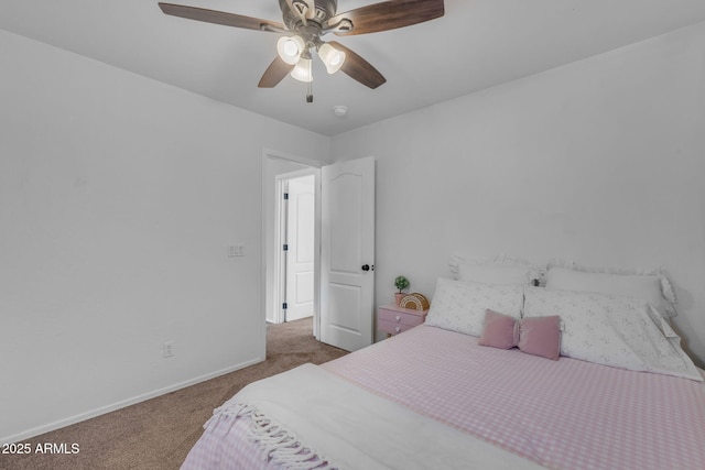 bedroom featuring baseboards, carpet, and ceiling fan