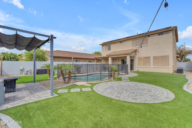 view of yard featuring a fenced in pool, a patio, central AC unit, and a fenced backyard