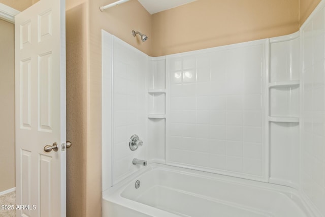 bathroom with shower / washtub combination