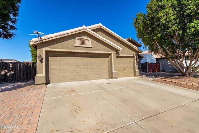 single story home with a garage