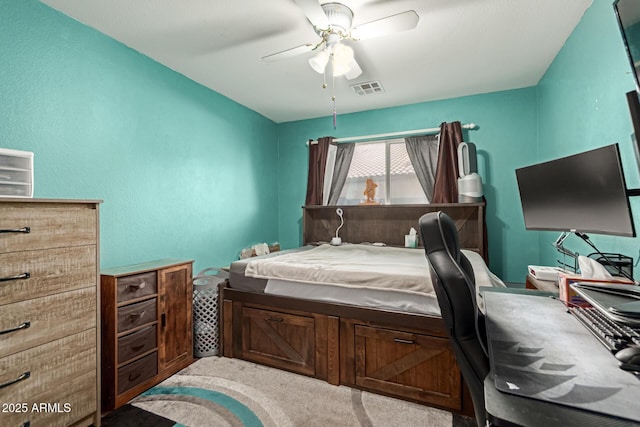 carpeted bedroom featuring ceiling fan