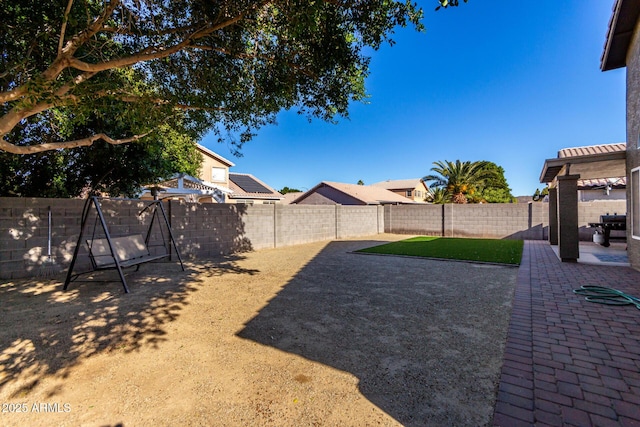 view of yard with a patio area