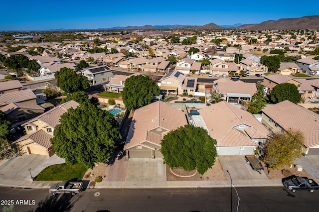 bird's eye view with a mountain view