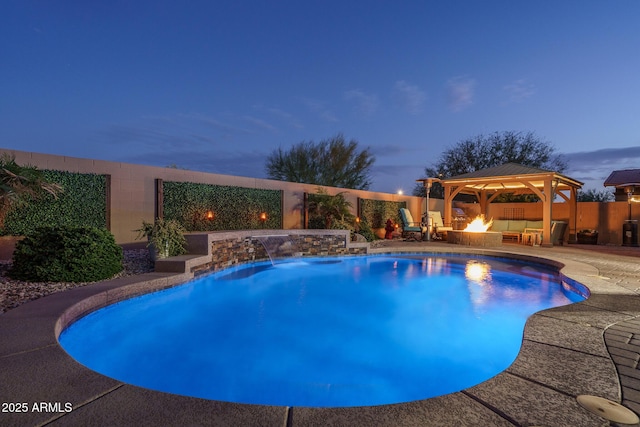 view of swimming pool with a fire pit, a gazebo, a patio, and a fenced in pool