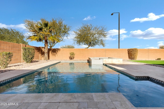 view of pool featuring an in ground hot tub