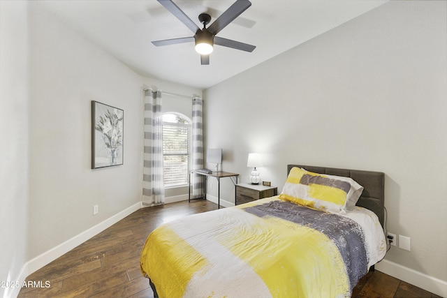 bedroom with wood finished floors, baseboards, and ceiling fan